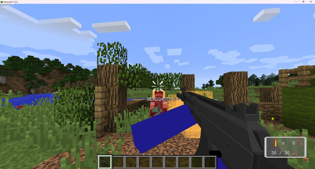 銃を手に持ち「右クリック」