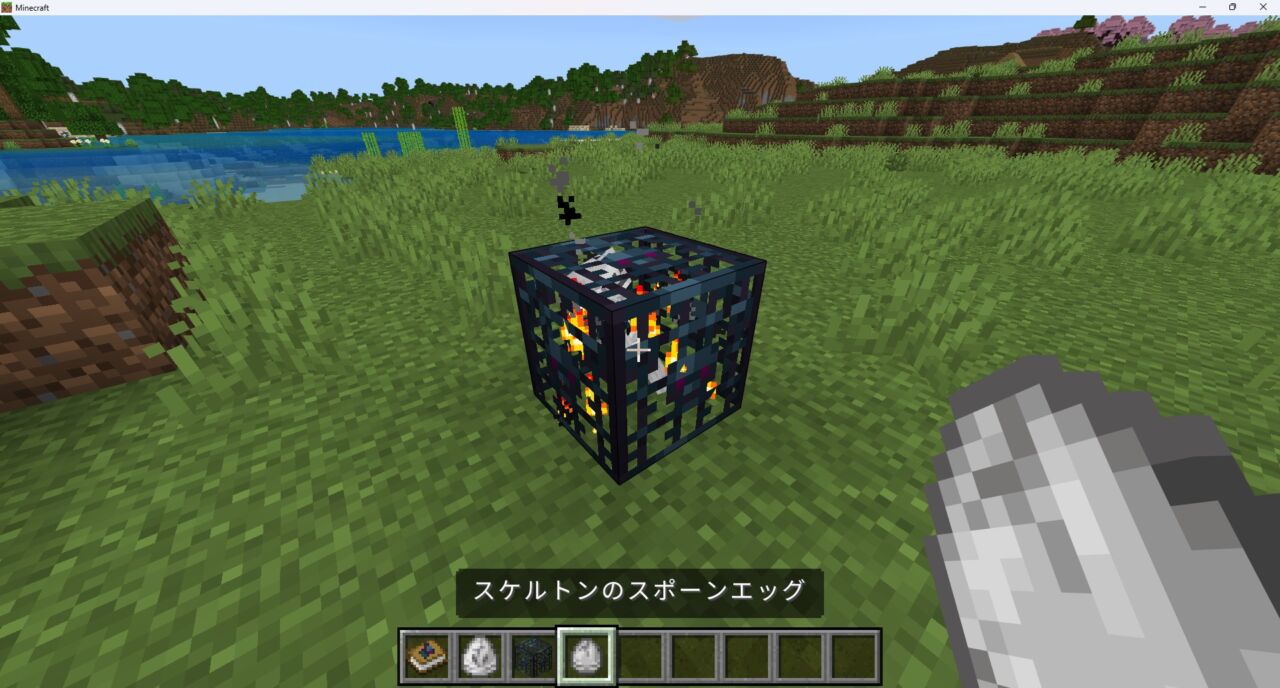 Spawner Craftで作ったスポナーにスポーンエッグを使う様子